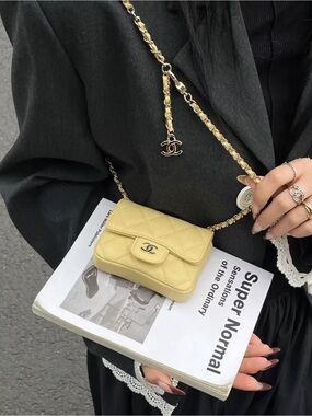 CHANEL Quilted Mini Crossbody in Light Yellow with Gold Chain